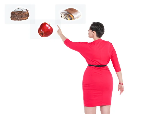 Vackra plus size kvinna att göra valet mellan friska och unhe — Stockfoto