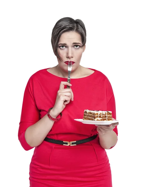 Mujer de talla grande con tenedor tentador con pastel —  Fotos de Stock