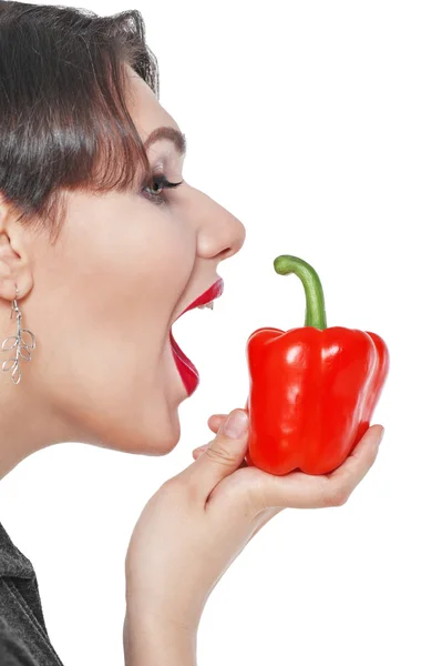 Beautiful plus size woman with red pepper isolated — Stock Photo, Image