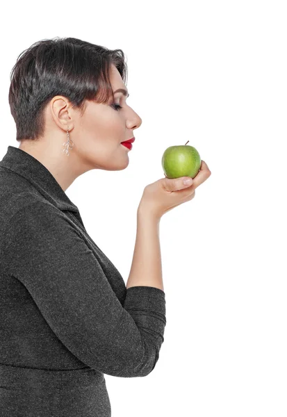 Beautiful plus size woman with green apple isolated — Stock Photo, Image