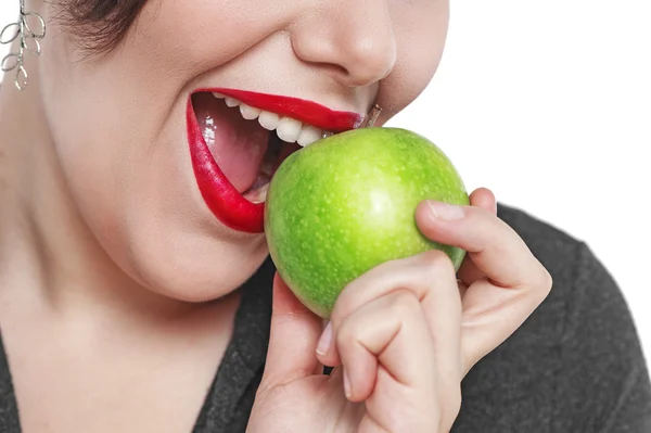 Closeup of the woman face with green apple isolated — Stock Photo, Image