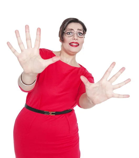 Scared screaming beautiful plus size woman in red dress isolated — Stock Photo, Image