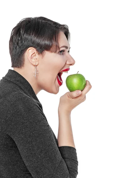 Beautiful plus size woman with green apple isolated — Stock Photo, Image