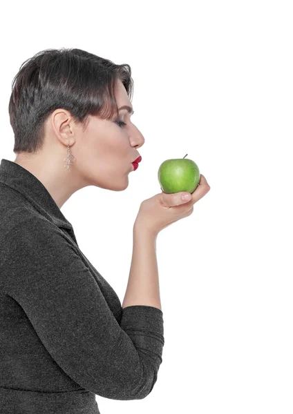 Beautiful plus size woman with green apple isolated — Stock Photo, Image