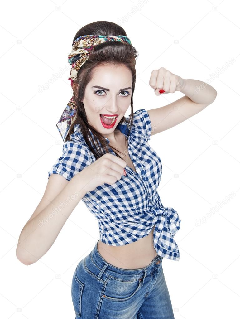 Beautiful woman in retro pin-up style with her fists up, ready t