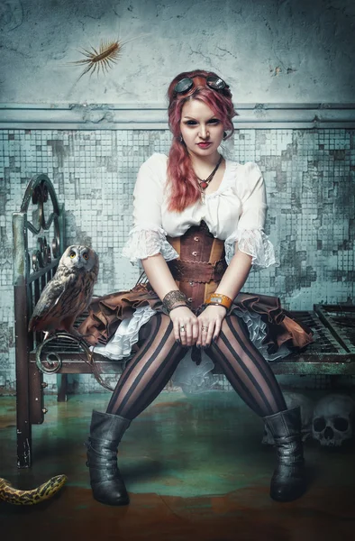 Beautiful steampunk witch in the abandoned room — Stock Photo, Image