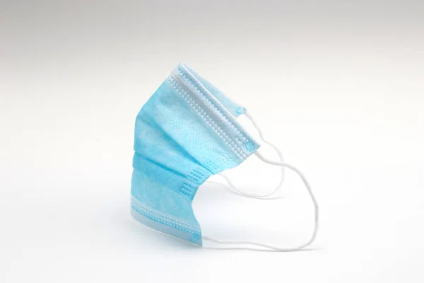 Medical protective mask on white background. PPE Surgical disposable masks.