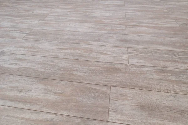 White wood laminate Floor. New vinyl laminate floor tile