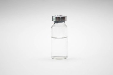 Aşıyla Ampulü. İçinde ilaç olan boş bir şişe. Aşıyla Ampulü. İlaçlı boş şişe..