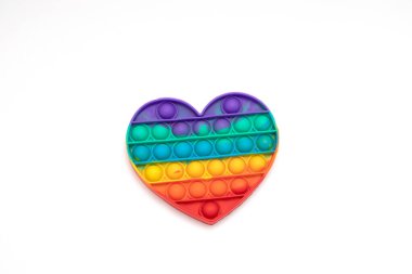 Oynat bakalım. Beyaz arka planda silikon lastik basit gamzeli oyuncak.