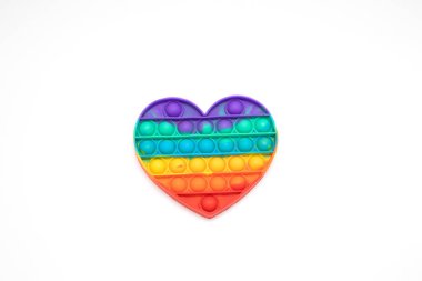 Patlat bakalım oyuncak. Beyaz arka planda silikon lastik basit gamzeli oyuncak.