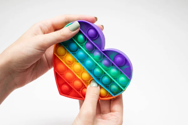 Pop Frauenhänden Antistress Spielzeug Für Kinder Einfache Grübchen — Stockfoto