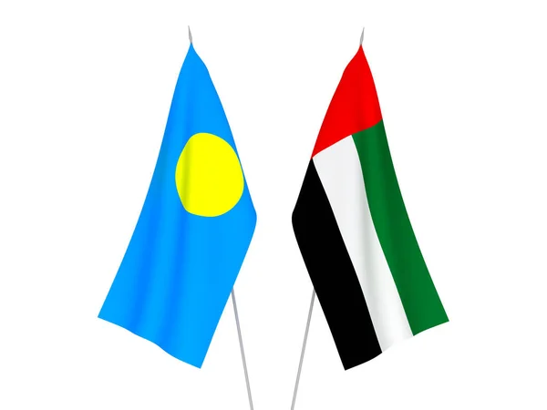Флаги ОАЭ и Палау — стоковое фото