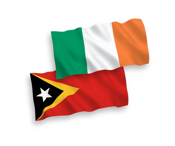 Bandiere dell'Irlanda e di Timor Est su sfondo bianco — Vettoriale Stock