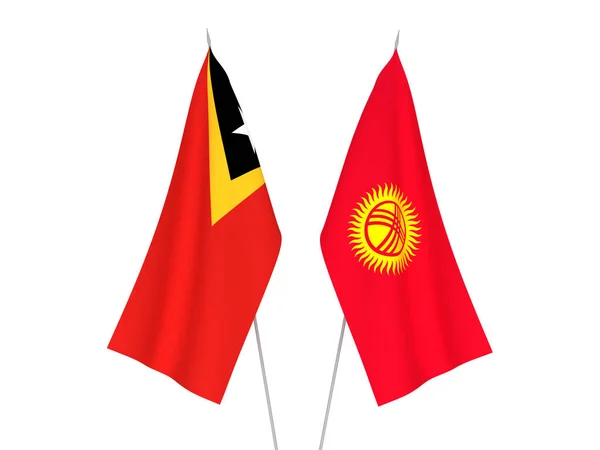 Kyrgyzstan and East Timor flags — Stock Photo, Image