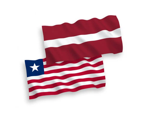 Flagi Łotwy i Liberii na białym tle — Wektor stockowy