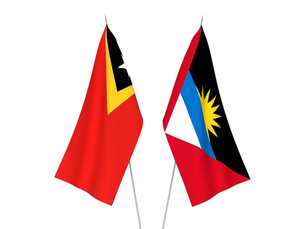 Antigua and Barbuda and East Timor flags — Stock Photo, Image