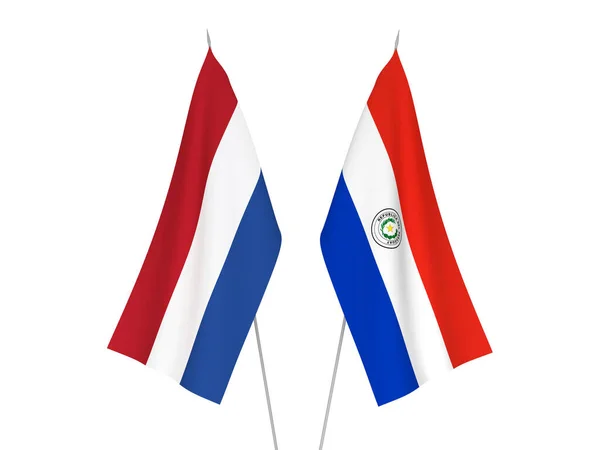 Nederland en Paraguay vlaggen — Stockfoto