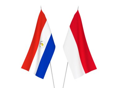 Beyaz arka planda Paraguay ve Endonezya 'nın ulusal kumaş bayrakları izole edildi. 3d resimleme.