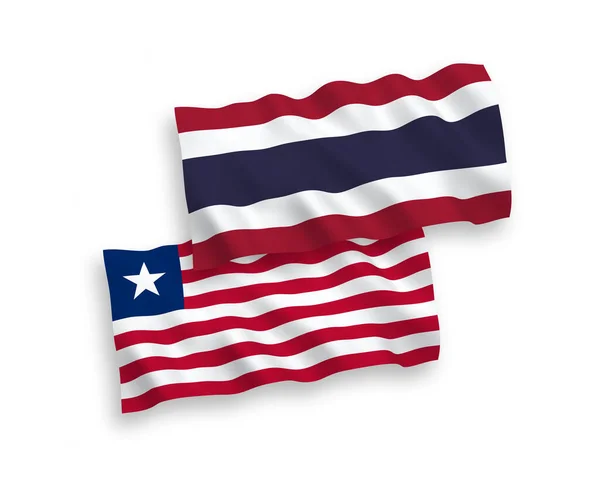 Flagi Liberii i Tajlandii na białym tle — Wektor stockowy