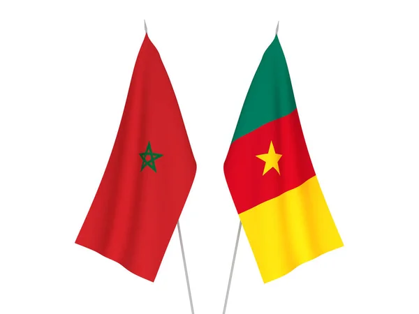 stock image National fabric flags of Morocco and Cameroon isolated on white background. 3d rendering illustration.