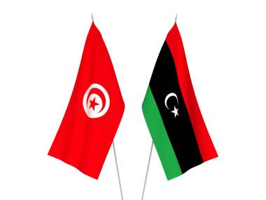 Beyaz arka planda Libya ve Tunus Cumhuriyeti 'nin ulusal kumaş bayrakları izole edildi. 3d resimleme.