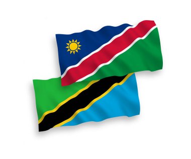 National vector fabric wave flags of Republic of Namibia and Tanzania isolated on white background. 1 to 2 proportion.