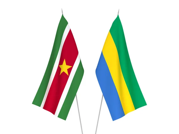 Bandeiras Tecido Nacional Gabão Suriname Isoladas Fundo Branco Ilustração Renderização — Fotografia de Stock