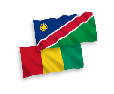 Beyaz arka planda Namibya Cumhuriyeti ve Gine 'nin ulusal taşıyıcı kumaş bayrakları izole edildi. 1 'e 2 oranında.