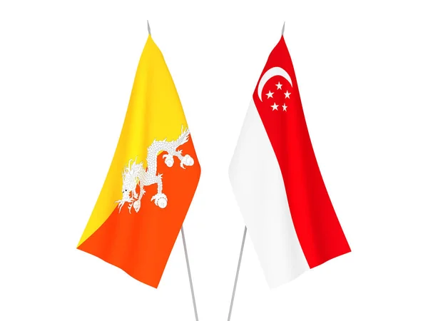 Konungariket Bhutans och Singapores flagg — Stockfoto