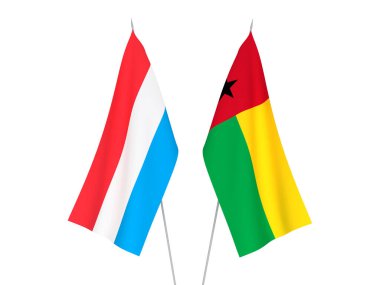 National fabric flags of Luxembourg and Republic of Guinea Bissau isolated on white background. 3d rendering illustration.