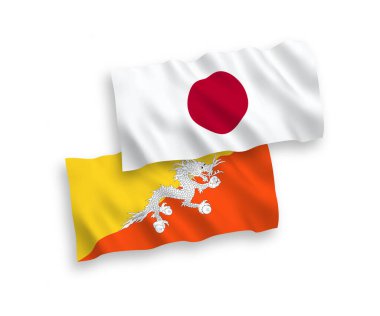 Japonya ve Bhutan Krallığı 'nın ulusal taşıyıcı kumaş bayrakları beyaz arka planda izole edildi. 1 'e 2 oranında.