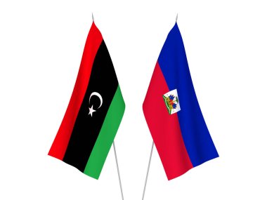 Beyaz arka planda Libya ve Haiti Cumhuriyeti 'nin ulusal kumaş bayrakları izole edildi. 3d resimleme.