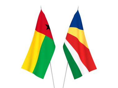 Beyaz arka planda Seyşeller ve Gine Bissau Cumhuriyeti 'nin ulusal kumaş bayrakları izole edildi. 3d resimleme.