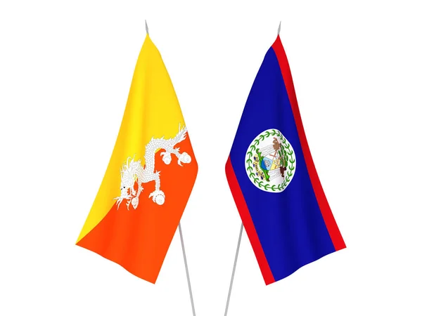 Εθνικές Σημαίες Υφάσματος Του Βασιλείου Του Μπουτάν Και Του Μπελίζ — Φωτογραφία Αρχείου