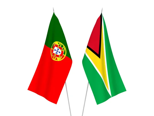 Kooperatif Guyana Cumhuriyeti ve Portekiz bayrakları — Stok fotoğraf