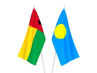 Beyaz arka planda Palau ve Gine Bissau Cumhuriyeti 'nin ulusal kumaş bayrakları izole edildi. 3d resimleme.