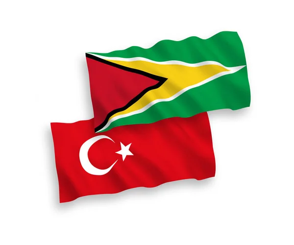 Beyaz arka planda Türkiye ve Guyana İşbirliği Cumhuriyeti Bayrakları — Stok Vektör