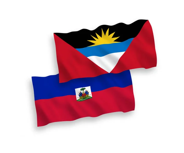 Banderas de la República de Haití y Antigua y Barbuda sobre fondo blanco — Vector de stock