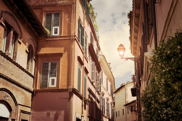 Beautiful street in Rome, Italy. Vintage filter, retro effect
