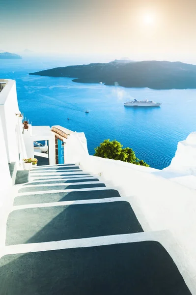 White architecture on Santorini island, Greece. Stairs to the sea. Travel destinations concept