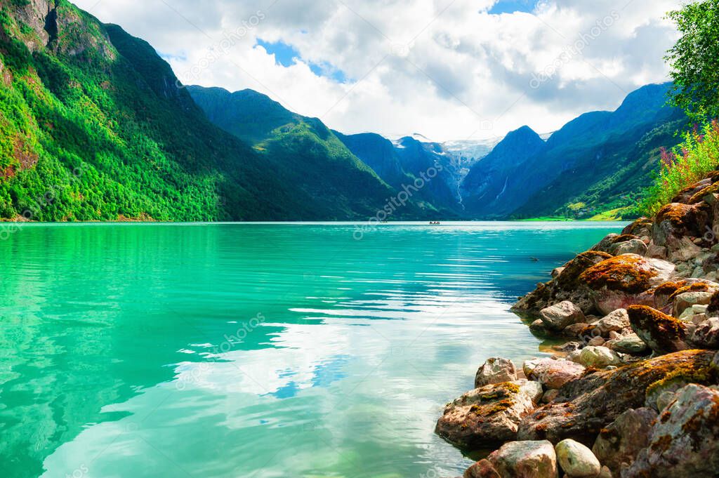 Beautiful lake and mountains with glacier in Norway. Summer landscape