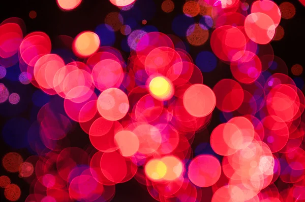 Fondo brillante de Navidad con luces rojas — Foto de Stock