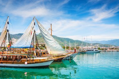 Tourist boats in the port of Alanya, Turkey clipart