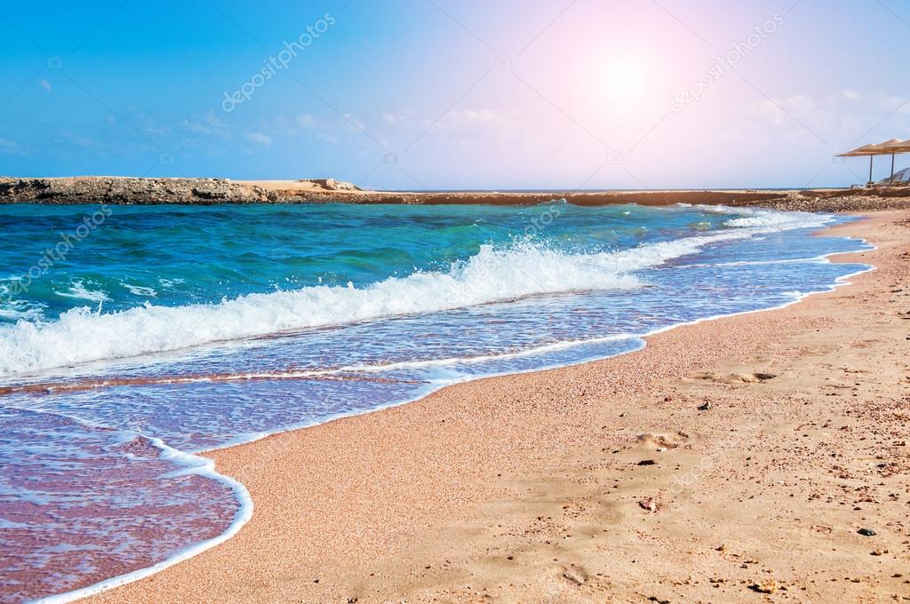 Tropical beach with blue sea