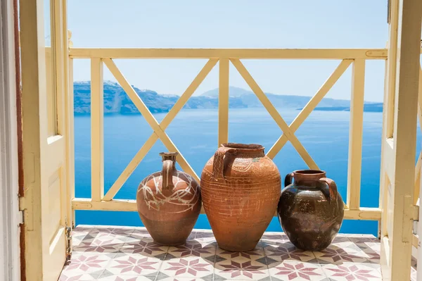 Decorative jugs on the balcony — Stock Photo, Image