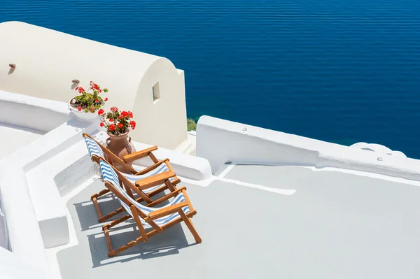 Sunbeds on the terrace of a hotel — Stok fotoğraf