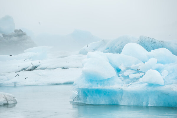 Blue icebergs in Jokulsarlon glacial lagoon, Iceland