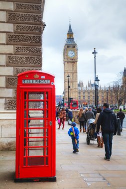 Famous red telephone booth in London clipart