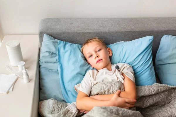 Sick Little Boy High Fever Headache Laying Bed Holding Thermometer — Stock Photo, Image